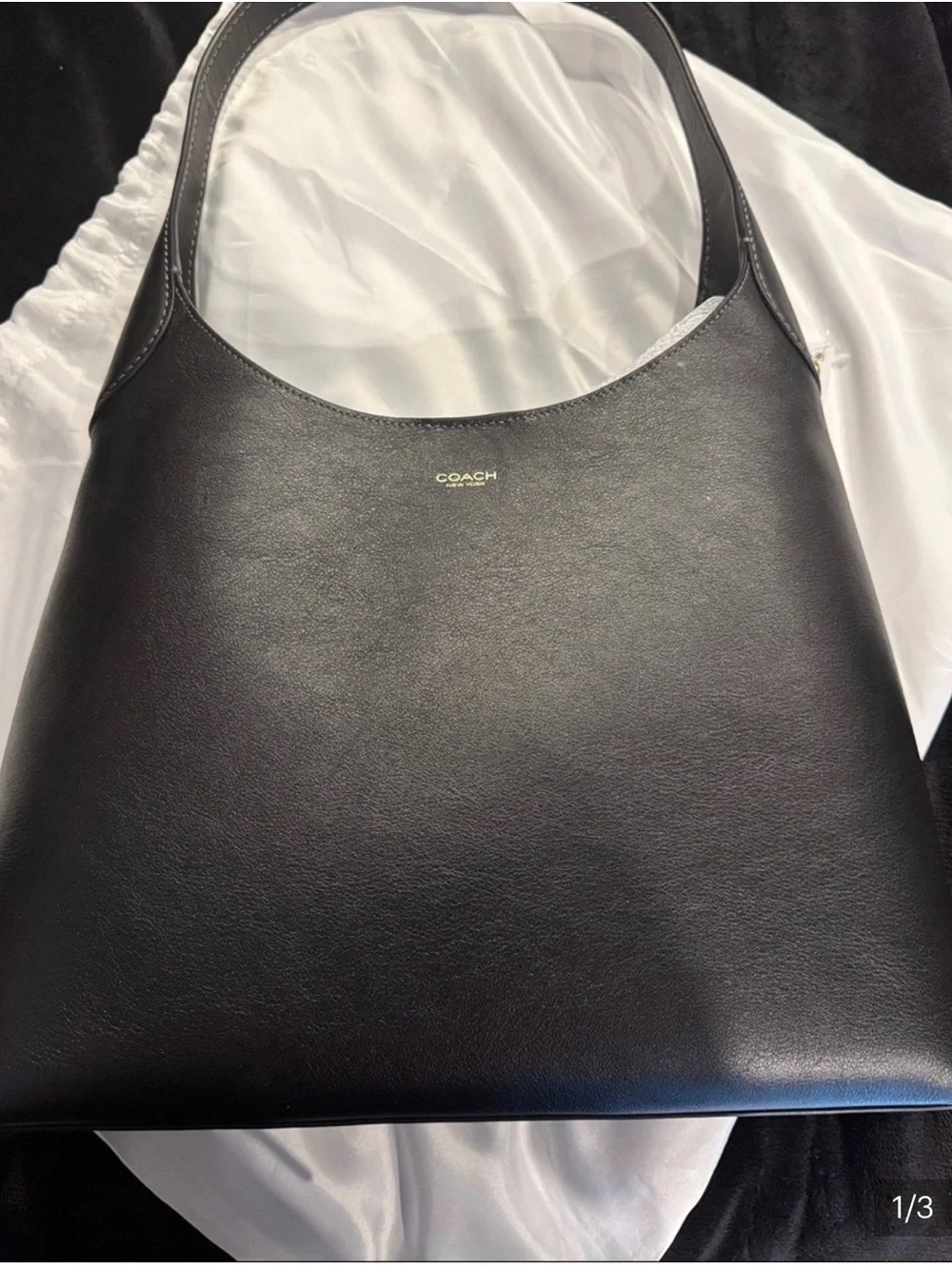 Coach sleek black